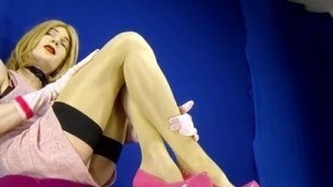 Blonde in pink dress for foot fetish fans