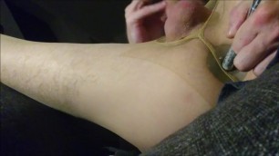 Butplugg and nylon fun.Cumshot on my own nylon feet