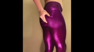 Ass spank in shiny leggings