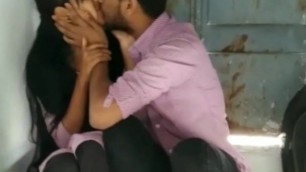 Lovers Kissing Infront of Friend