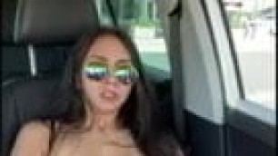 Sexy woman masturbates in her car