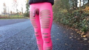 Torn pink leggings Public road walking .