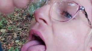 Skanky cumdump pig girl takes public facial in the woods