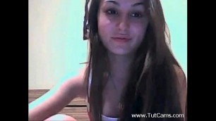 Brunette chick showing body on webcam